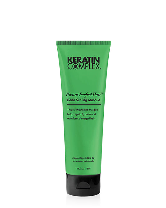 Green PicturePerfect hair masque bottle on white background