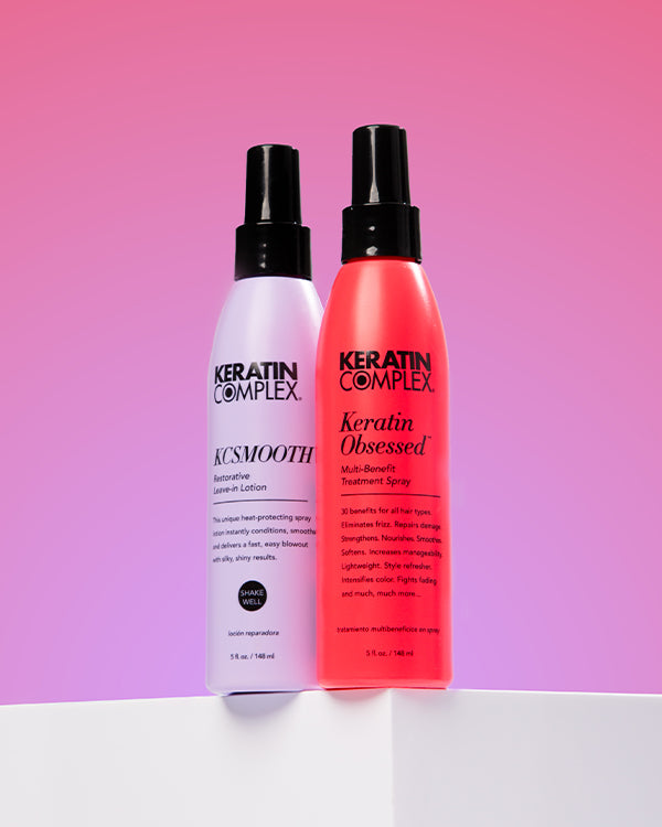 Keratin Obsessed Multi-Benefit Spray and KCSMOOTH Restorative Leave-in on purple background