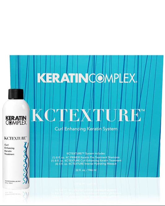 Blue KCTEXTURE box with bottle on white background