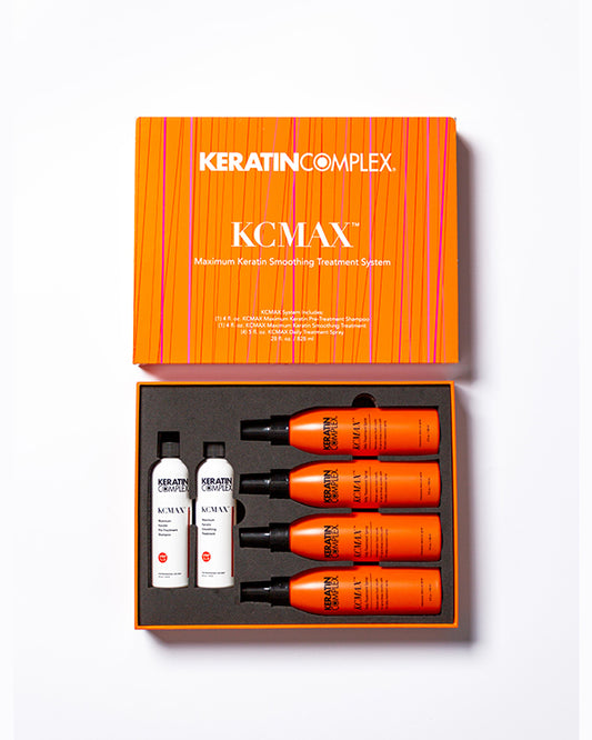 Orange open KCMAX box showing bottle and aftercare on white background