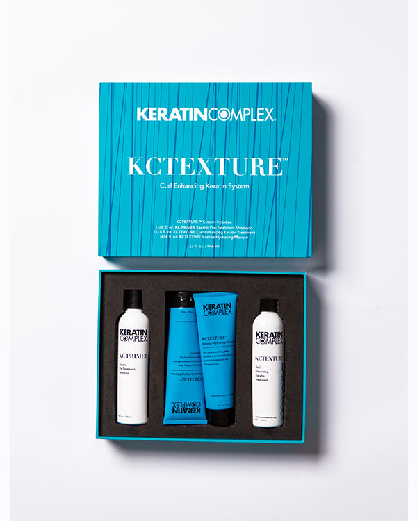 Blue open KCTEXTURE box showing bottle and aftercare on white background