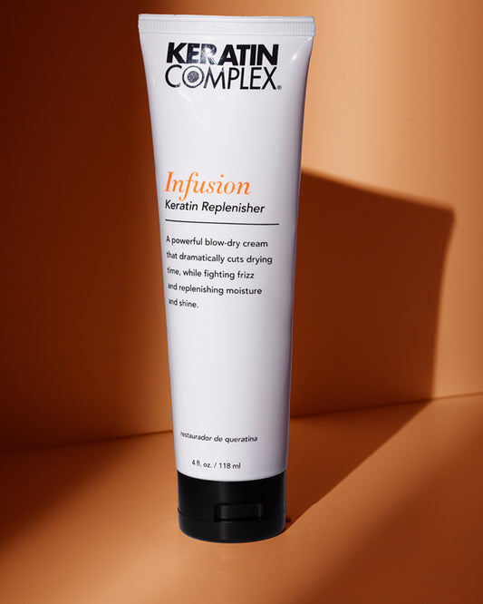 A bottle of Infusion on a brown background