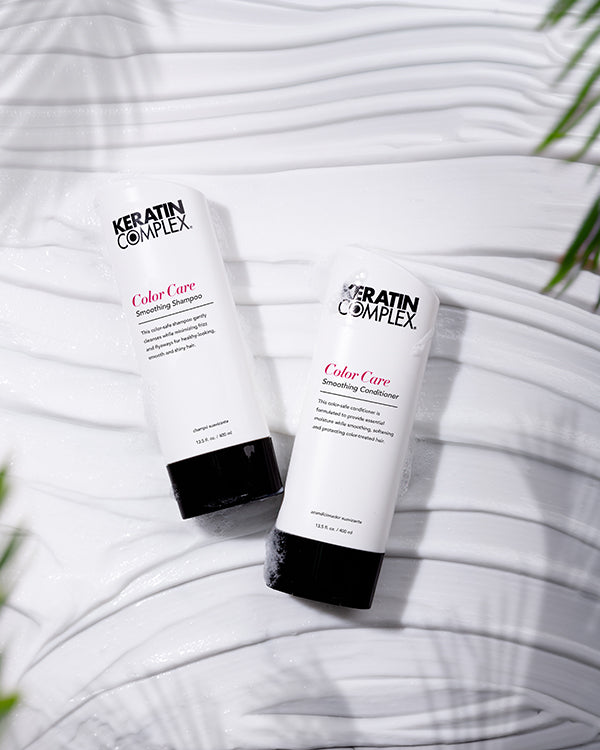 Color Care Smoothing Shampoo and conditioner bottle on a white textured background