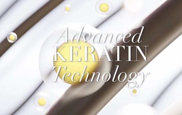 The image has text over hair strands infused with glowing yellow bubbles, highlighting the Keratin Technology || Advanced Keratin Technology