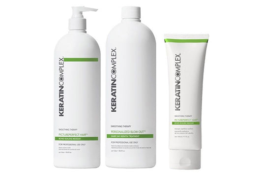Three hair products next to each other, the products are white and green