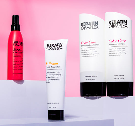 Keratin Complex products displayed against a pink background.