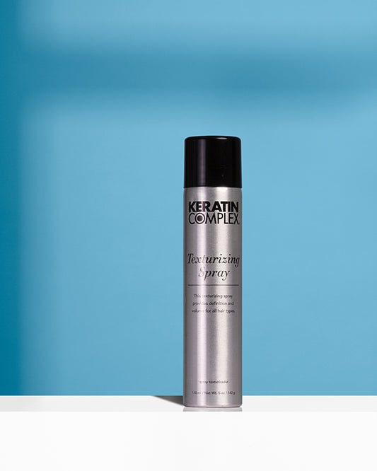 Texturizing Spray bottle on white background