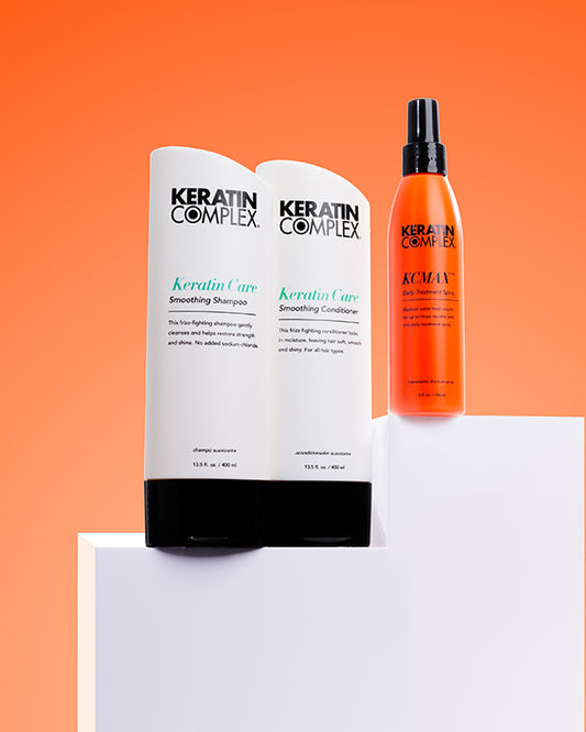 Keratin Care Smoothing Shampoo and conditioner and KCMAX Daily Treatment on Orange background