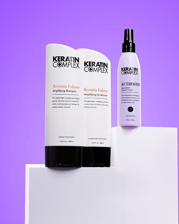 Keratin Volume Shampoo and Conditioner and KCSMOOTH Leave-In on a purple background