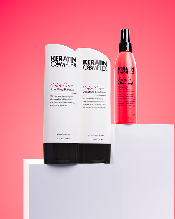 Color Care shampoo and conditioner and keratin obsessed on a pink background 