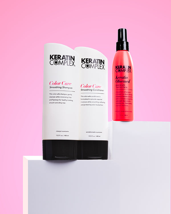 Color care shampoo and conditioner and keratin obsessed on pink background 