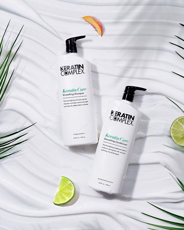 Keratin Care Smoothing Shampoo and conditioner Liter on a white textured background with limes