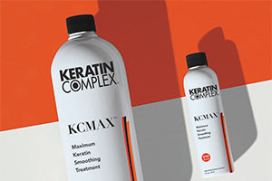 Two product bottles of KCMAX