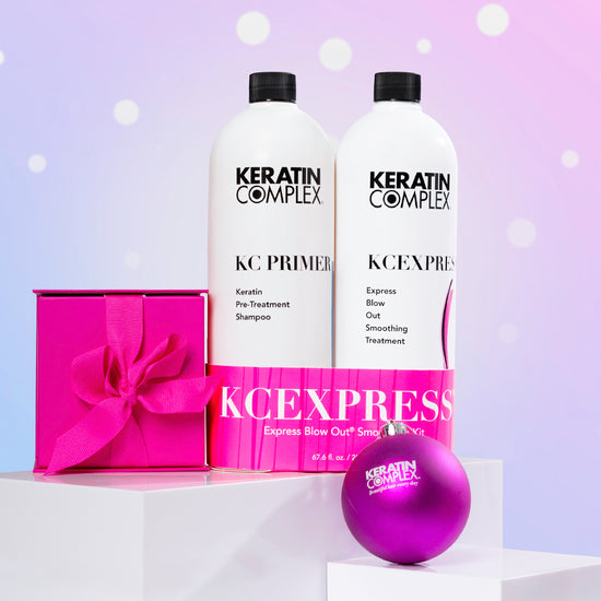 KCEXPRESS set against a soft holiday-themed background with pink and purple hues and snow-like dots.