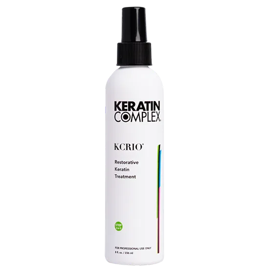 A white spray bottle of KCRIO restorative Keratin Treatment