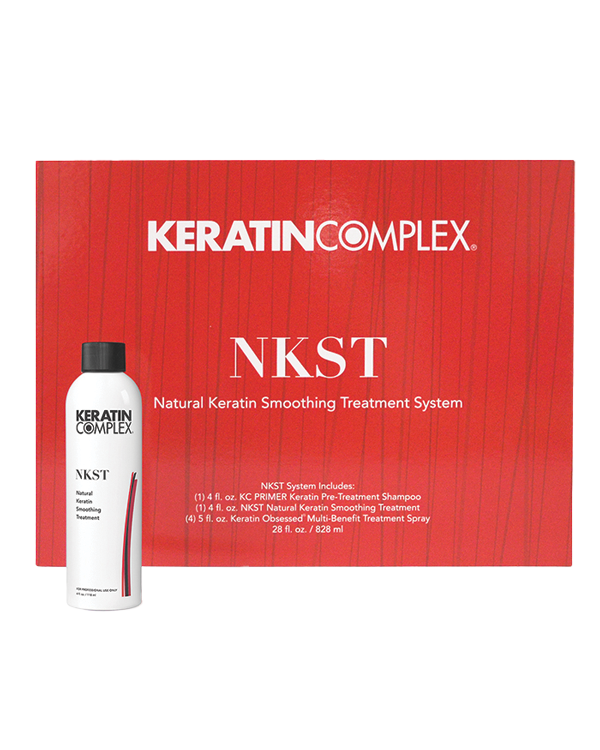 Red NKST box with bottle on white background 